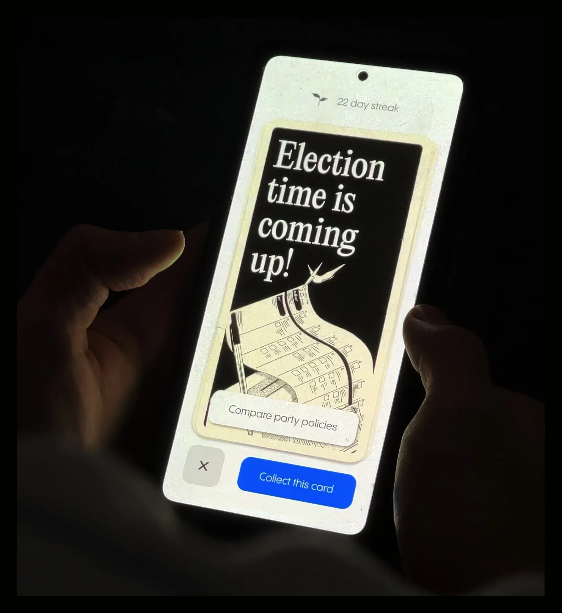 Someone holding a phone in the dark, showing a Climasaur card reading 'Election time is coming up!' with a 22 day streak.