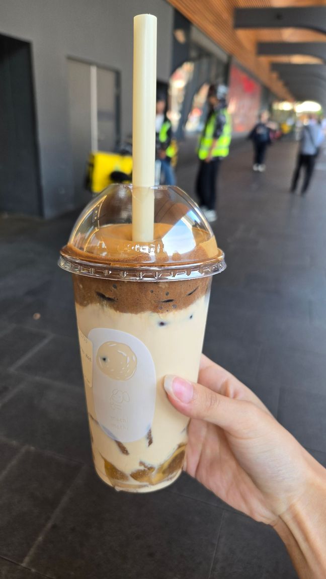 Mocha milk tea from Machi Machi, with honey jelly. The mocha is whipped into a foam on top.